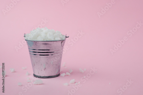 Sea salt in a tin bucket on...