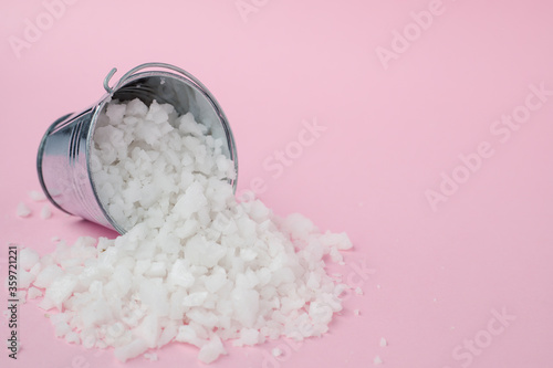 Sea salt in a tin bucket on...