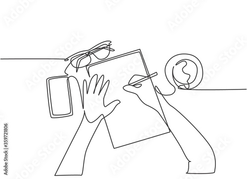One continuous line drawing of hand writing gesture on a piece of paper beside glasses, smartphone and a cup of coffee. Writing business draft concept. Single line draw design vector illustration