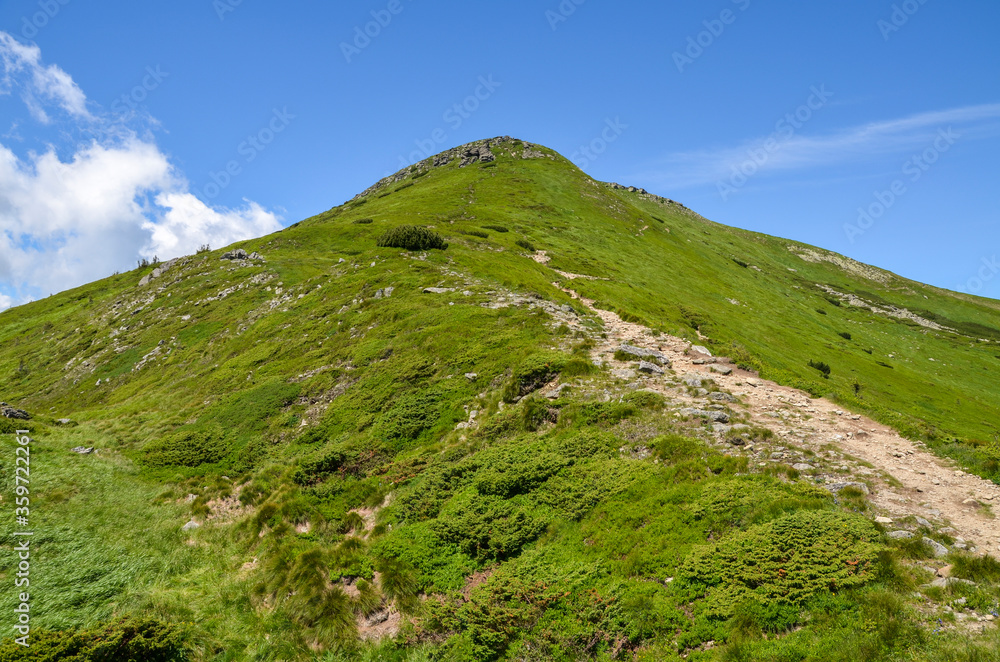 One of the highest peaks of the Ukrainian Carpathians is Mount Turkul, located on the Chornohora ridge. At the foot of the mountain is Nesamovyte Lake