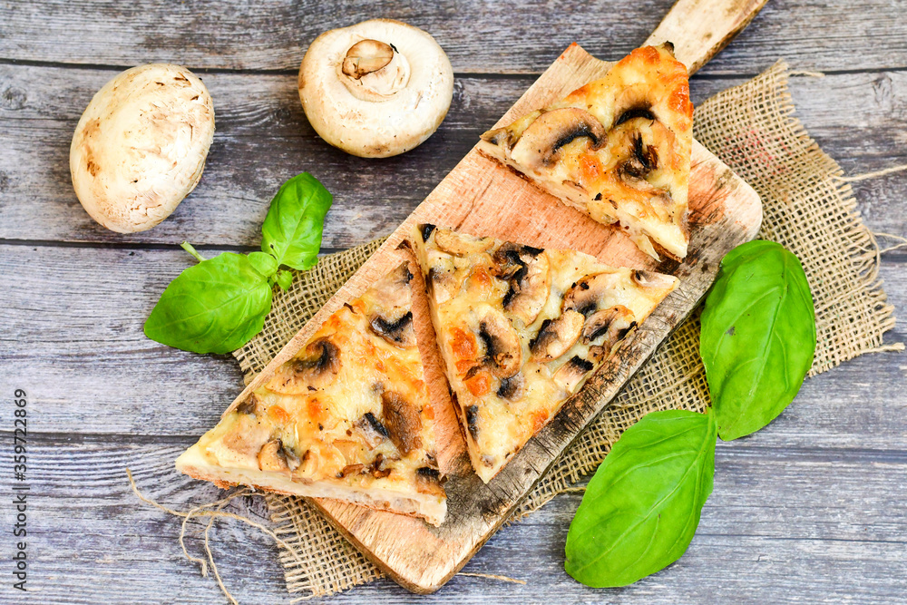 Mushroom italian roman style pizza. Parmesan cheese, cream, olives , , garlic, mushrooms, tomato sauce Mushroom italian roman style pizza. Parmesan cheese, cream, olives , , garlic, mushrooms, tomato sauce
