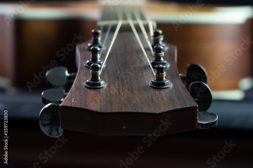 Classic guitar, Close-up picture The Headstock of old classic guitar