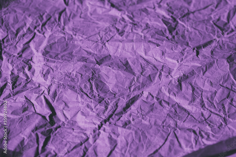 Crumpled purple paper texture and background. Abstract purple background for design. Crumpled purple paper texture and background. Abstract purple background for design.