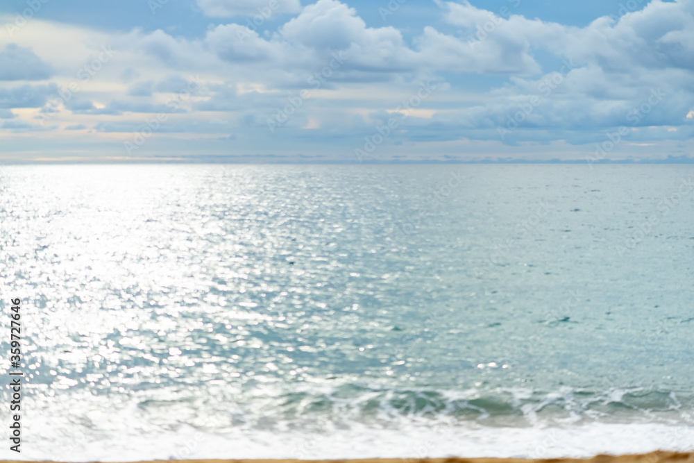 sea beach and reflection in water, cloudy blue sky background sea beach and reflection in water, cloudy blue sky background