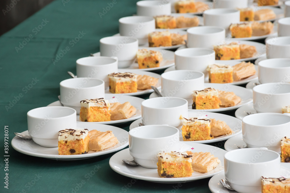 Coffee break at conference meeting. Set of coffee break arranged on the table. Coffee break at conference meeting. Set of coffee break arranged on the table.