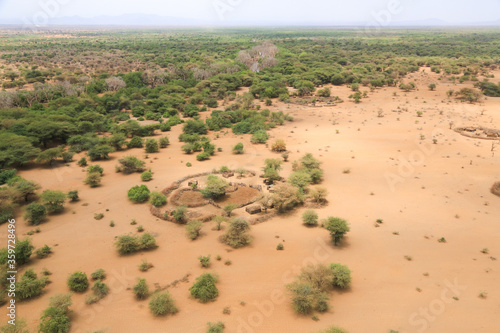 Traditional Masai dwelling in the Great Rift Valley, Kenya. The Great Rift Valley is part of an intra-continental ridge system that runs through Kenya from north to south. photo