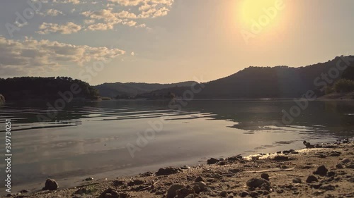 El Chorro Spanish shimmering mountain valley lake at sunset tranquil scene landscape