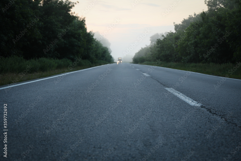 Foggy morning road. Beautiful summer morning. Travel Foggy morning road. Beautiful summer morning. Travel