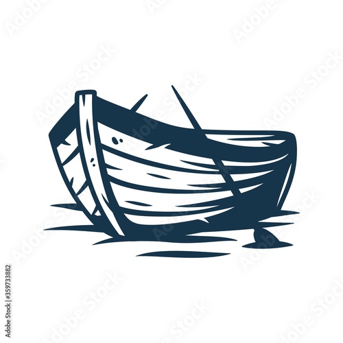 Wooden boat on waves or and paddle