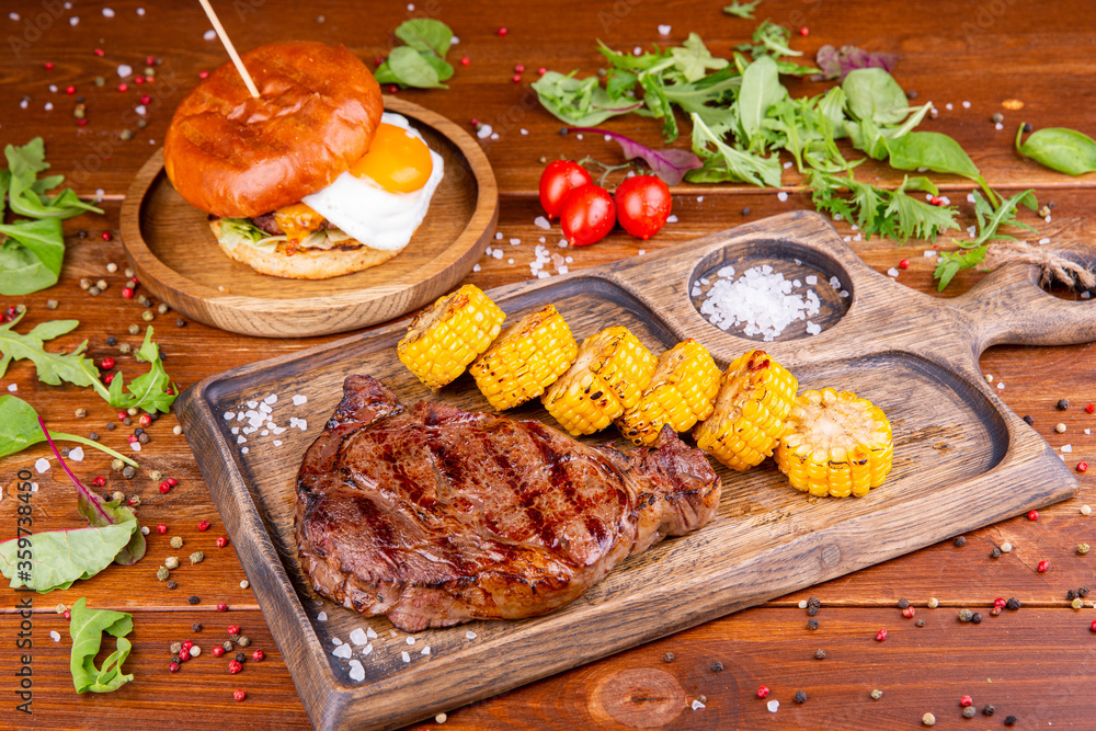 Fried steak with corn, spices and fresh greens
Fried steak with corn, spices and fresh greens