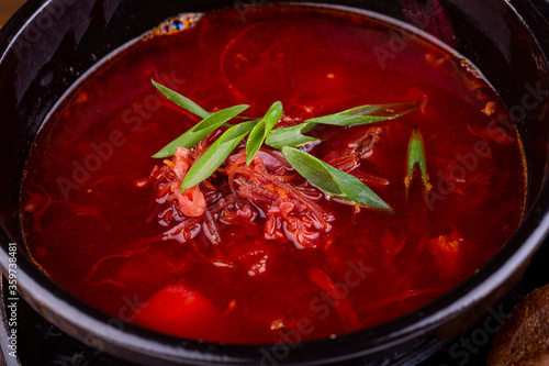 Borsch on beef broth, with potatoes, cabbage and fresh greens
