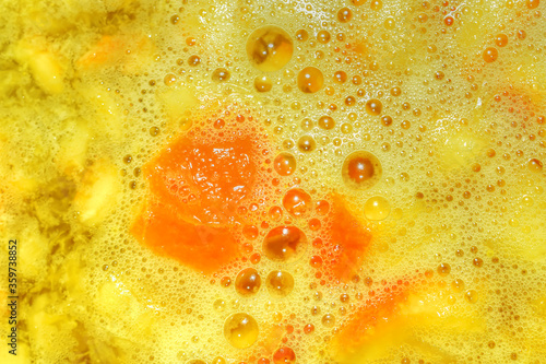 close up of orange juice in early stages of preparation