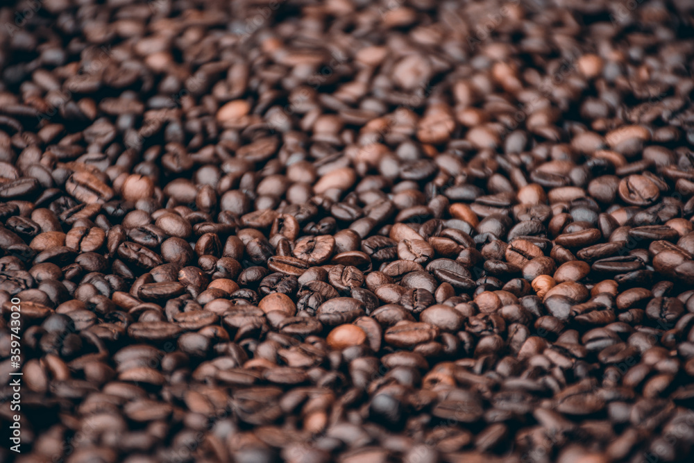 a heap of black coffee beans a heap of black coffee beans