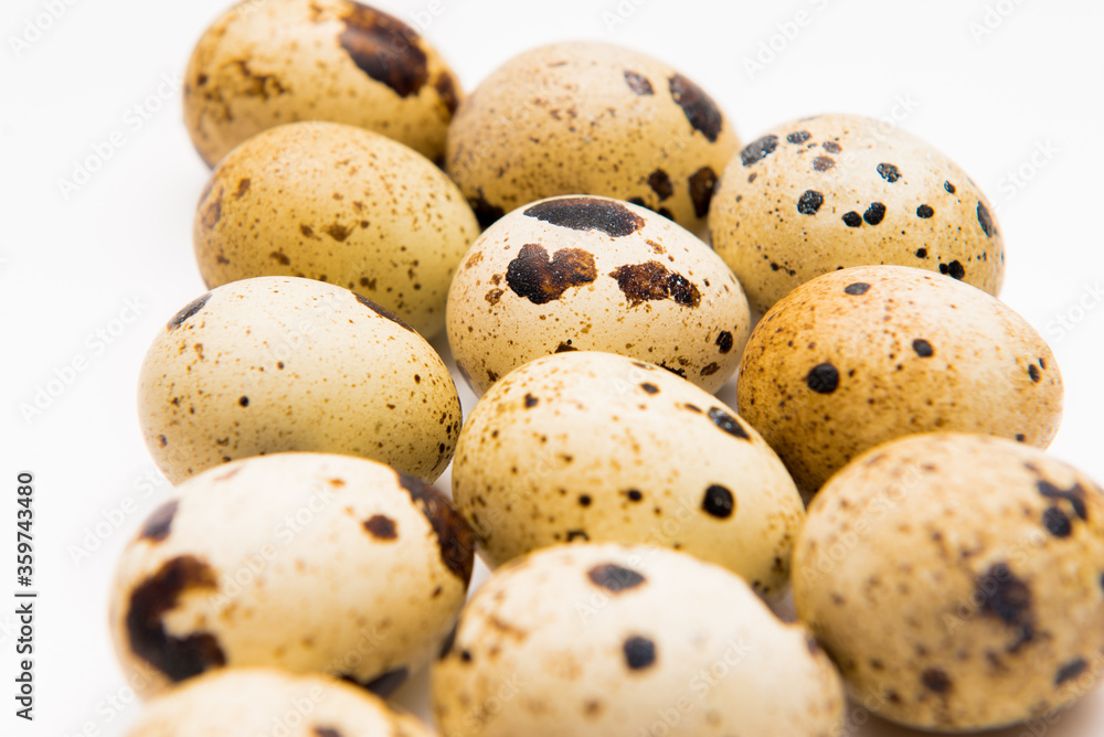 Food: group of quail eggs, isolated on white background