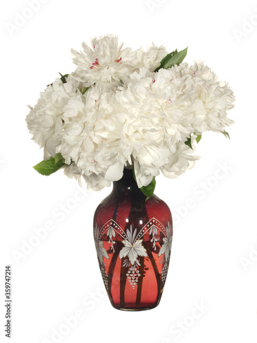 Beautiful bouquet of white peonies in a glass vase Isolated on a white background.