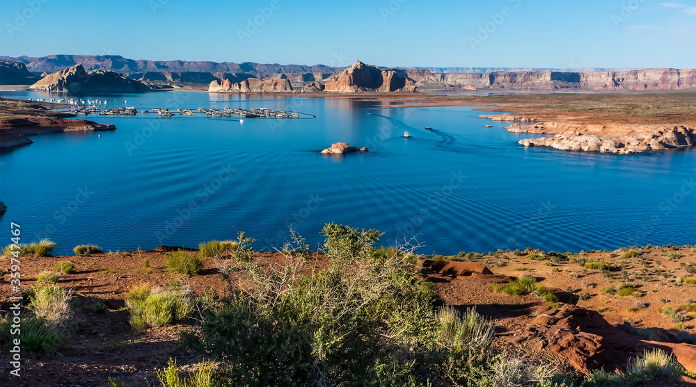 Ripples fan out across Lake Powell from passing vessels close to  Page, Arizona