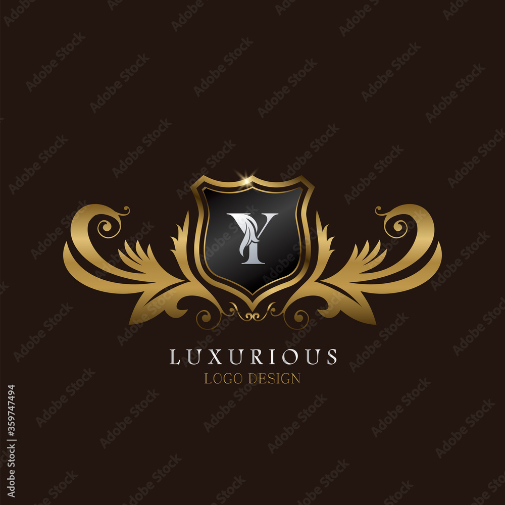 Golden Y Logo Luxurious Shield, creative vector design concept for luxury brand identity.