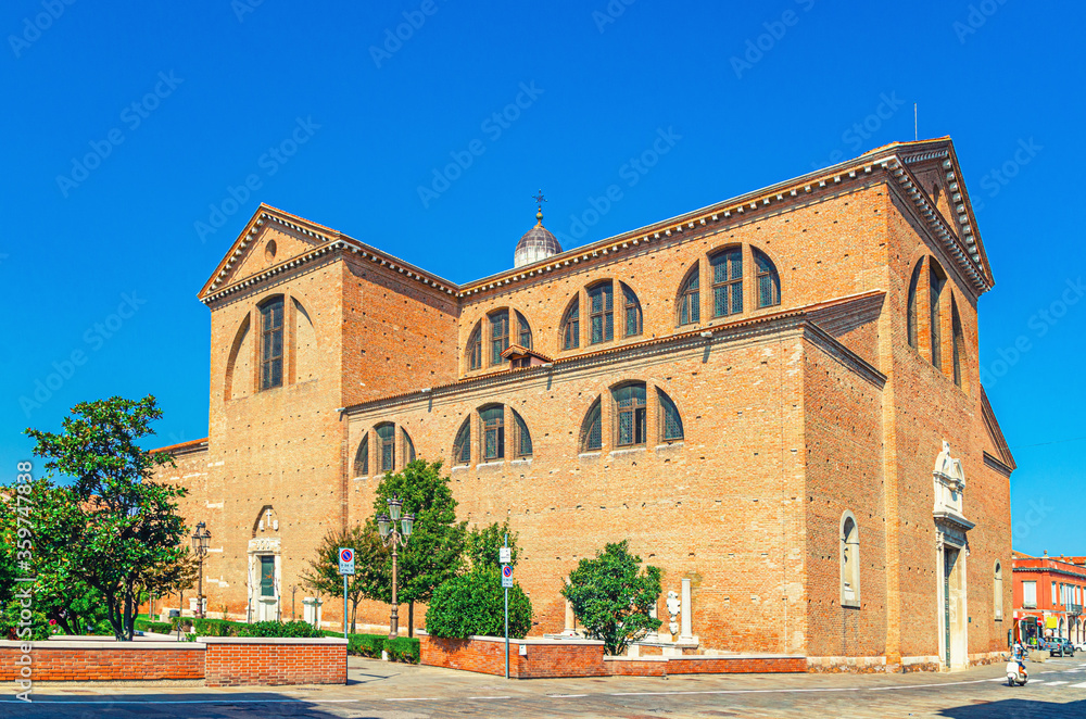 Cathedral Santa Maria Assunta Duomo Roman catholic church in Chioggia town historical centre, blue sky background in summer day, Veneto Region, Northern Italy