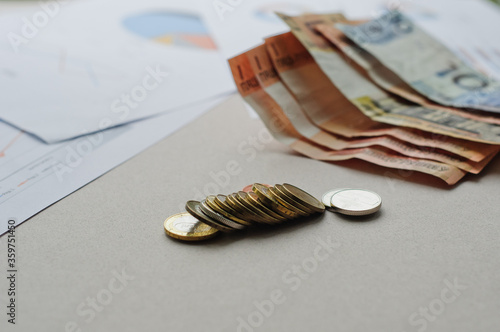 New banknotes and coins of the Belarusian ruble. The redenomination of the Belorusian ruble since July 1, 2016. Top view with copy space. photo