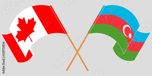 Crossed and waving flags of Azerbaijan and Canada