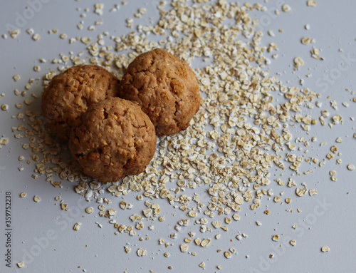 oatmeal cookies and oatmeal on a white background close up