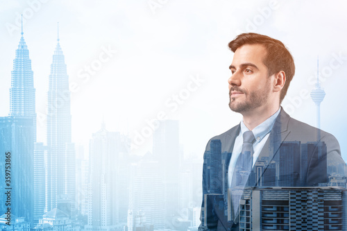 Photography Young handsome businessman in suit thinking how to succeed, new career opportunities, MBA