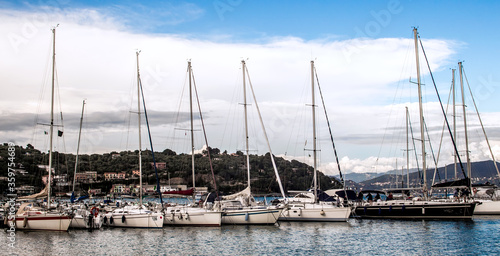 Moored sailboats in Portovenere bay in Italy on a sunny summer day