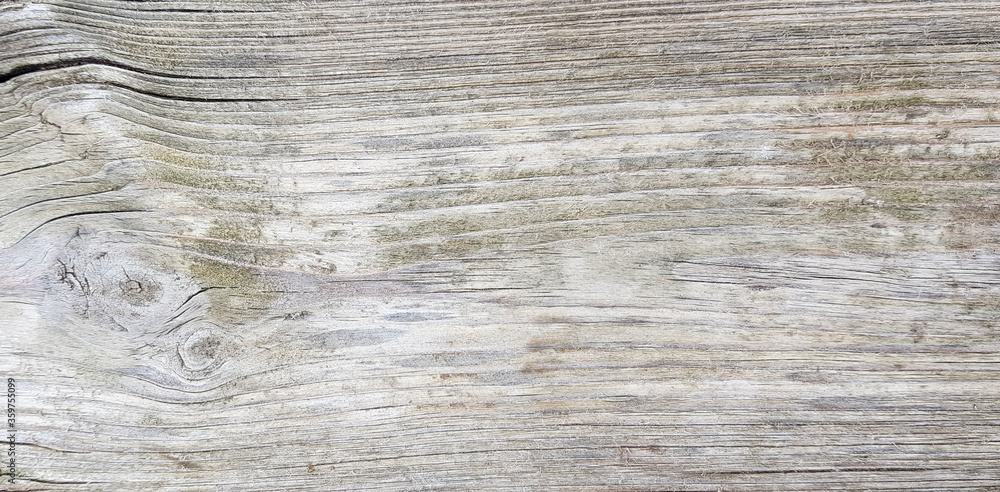 Fototapeta premium An old light wooden background