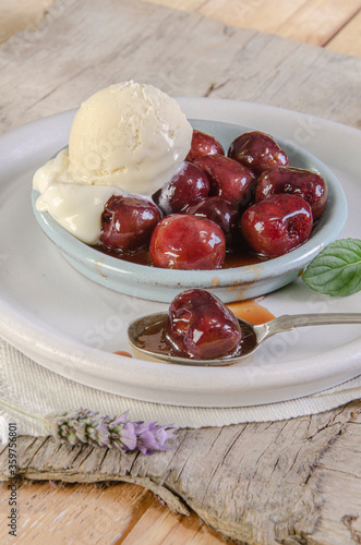Valokuvatapetti A nice bowl of cherries jubilee with scoop of vanilla ice cream
Sumptuous desser