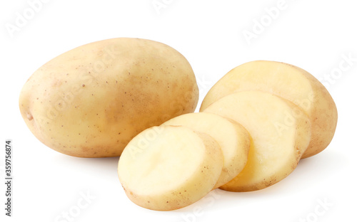 Young whole potatoes and slices on a white background. Isolated