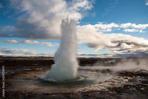 Geysers hot boiling water at haukadalur geothermal park in Iceland photo