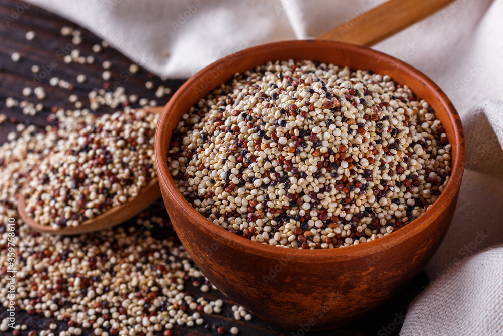 mix of quinoa grains on dark wooden rustic background mix of quinoa grains on dark wooden rustic background