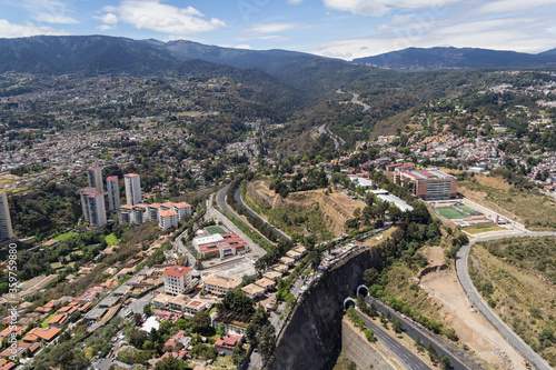 Aerial view of a toll highway tunnel in modern Mexico City of the road towards Toluca