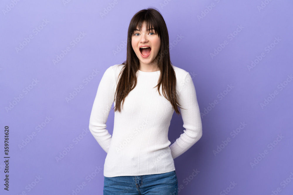 Young Ukrainian woman isolated on purple background with surprise facial expression Young Ukrainian woman isolated on purple background with surprise facial expression