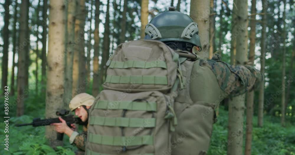 Fully Equipped Soldiers Wearing Camouflage Uniform Attacking Enemy Fully Equipped Soldiers Wearing Camouflage Uniform Attacking Enemy