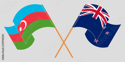 Crossed and waving flags of Azerbaijan and New Zealand