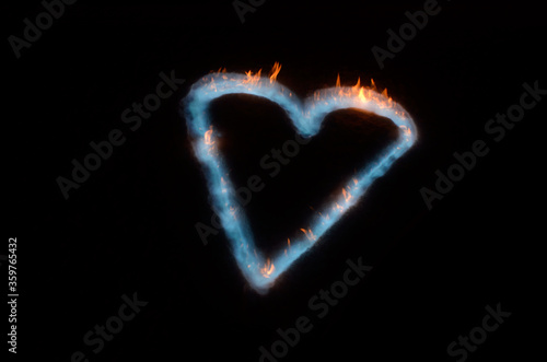 vibrant heart shape burning blue in white snow