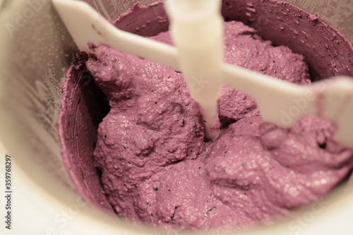 Blueberry Ice Cream, Gelato, mixing in Ice Cream Maker, an easy machine for homemade ice cream.