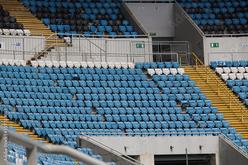 Lines Of Empty Plastic Spectators Chairs In A Grandstands