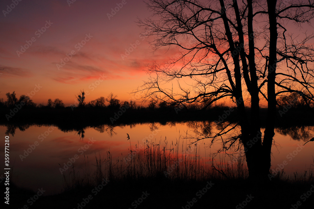 Colorful sunset by the Odra River, Poland.