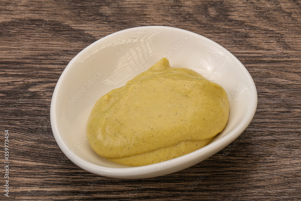 Dijon mustard sauce in the bowl Dijon mustard sauce in the bowl