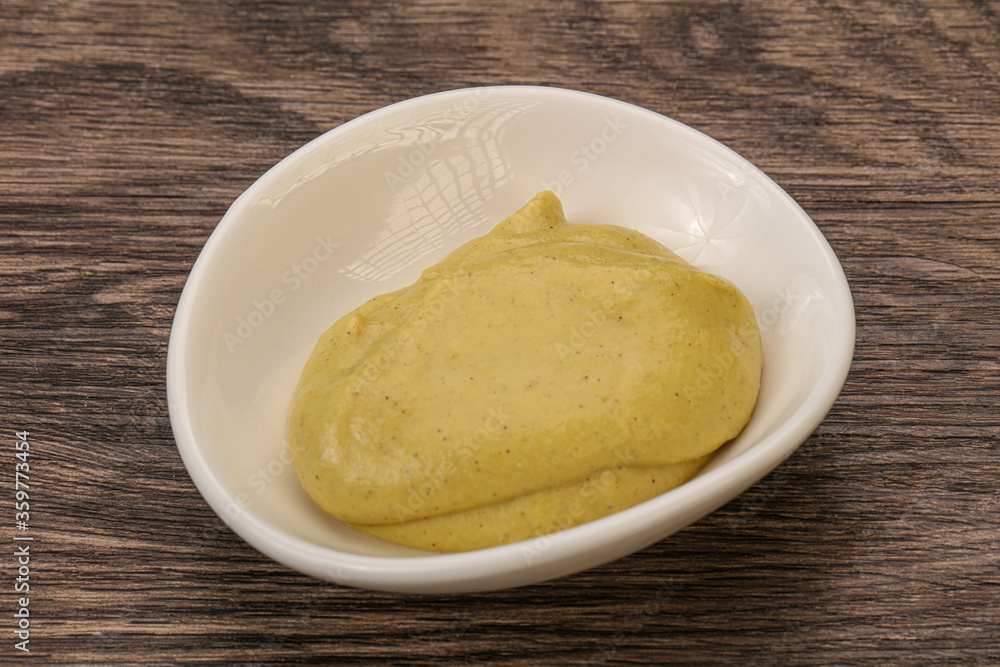 Dijon mustard sauce in the bowl