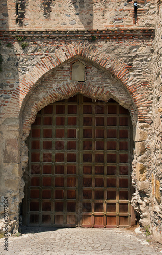 Ancient door at Svetitskhoveli Cathedral, Mtskheta, Georgia photo