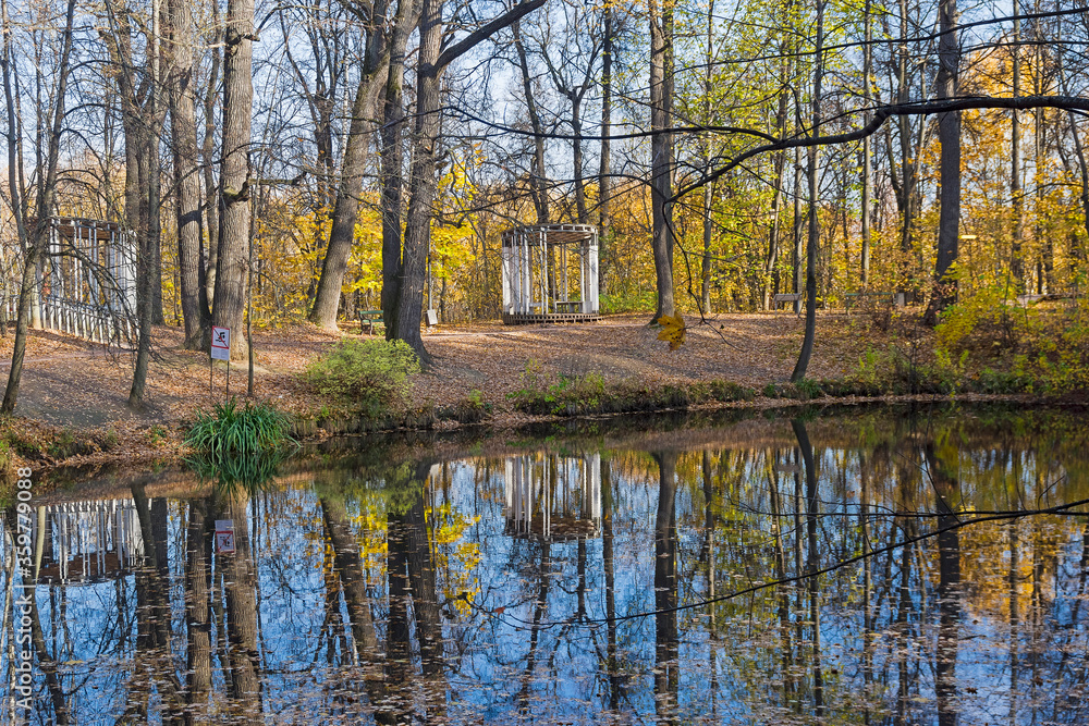 Pond in the autumn forest park. Pond in the autumn forest park.