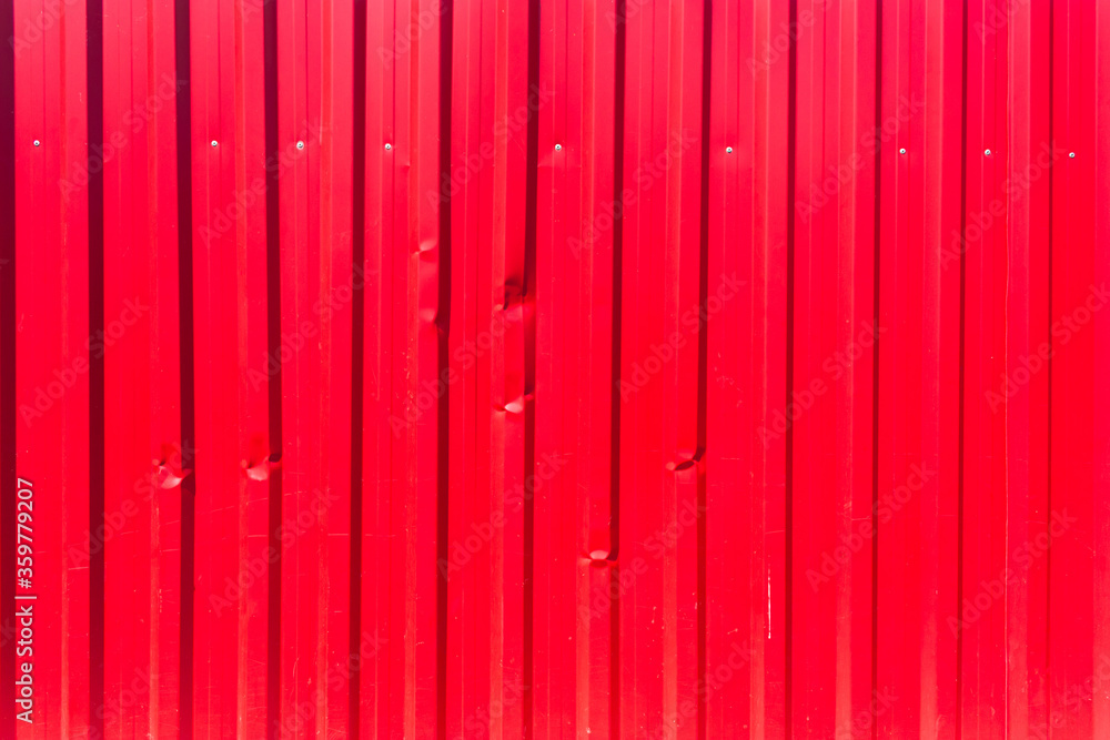 Red vertical aluminum, crumpled, background Red vertical aluminum, crumpled, background