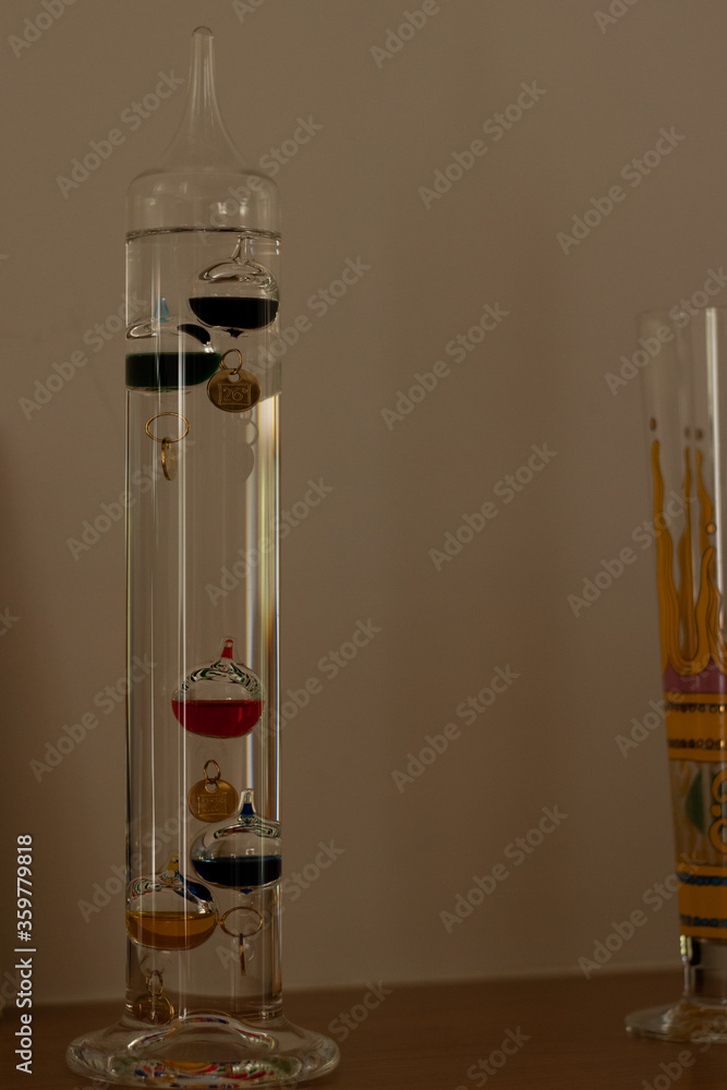 Galileo thermometer temperature calculate old vintage liquid Stock Photo Adobe Stock