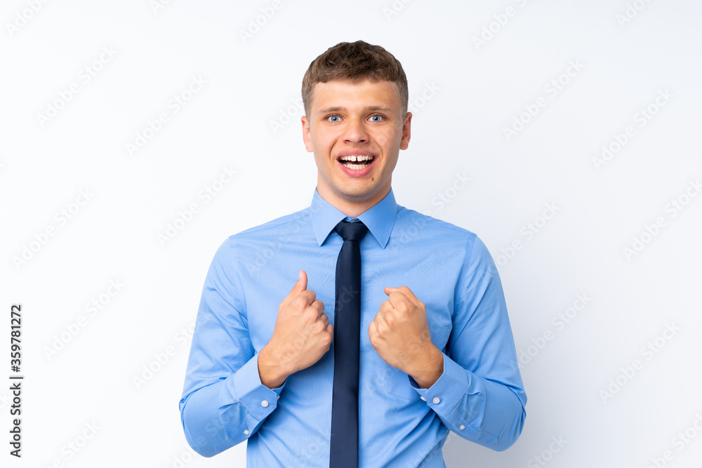 Young handsome businessman celebrating a victory Young handsome businessman celebrating a victory