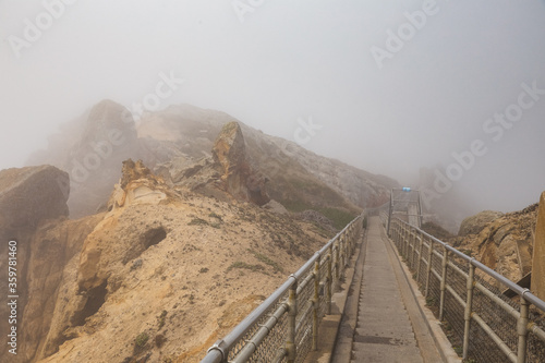 staircase to lighthouse on foggy coast of Point Reyes National Seashore  California