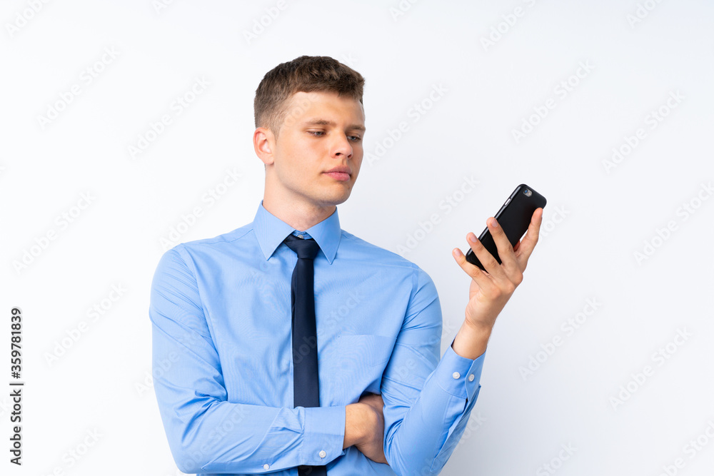 Young handsome businessman over isolated white background Young handsome businessman over isolated white background