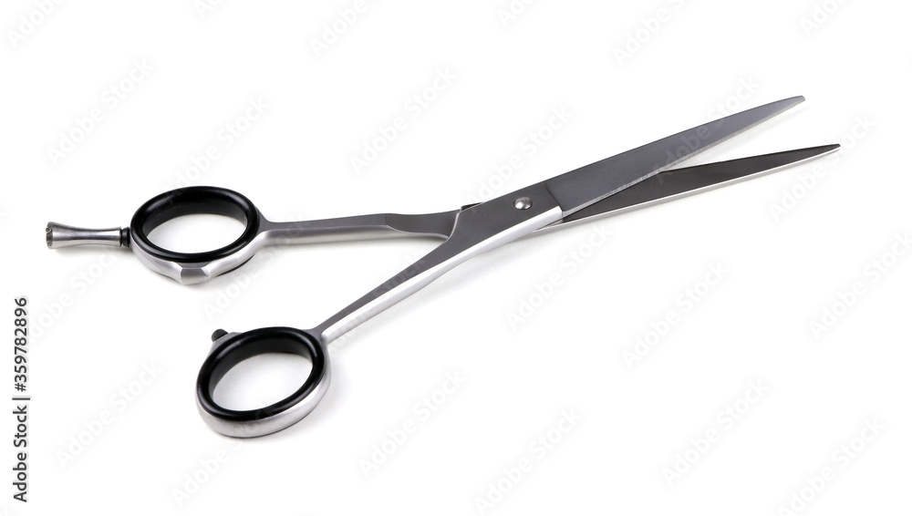 Hairdressing scissors isolated on a white background. Hair cutting scissors. Professional shears. Hairdressing scissors isolated on a white background. Hair cutting scissors. Professional shears.